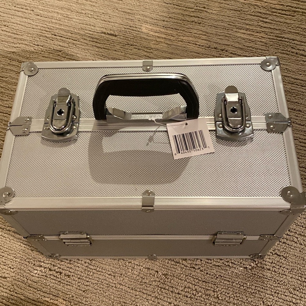 Silver chrome LG Makeup train case brand new, tag still on, perfect gift
